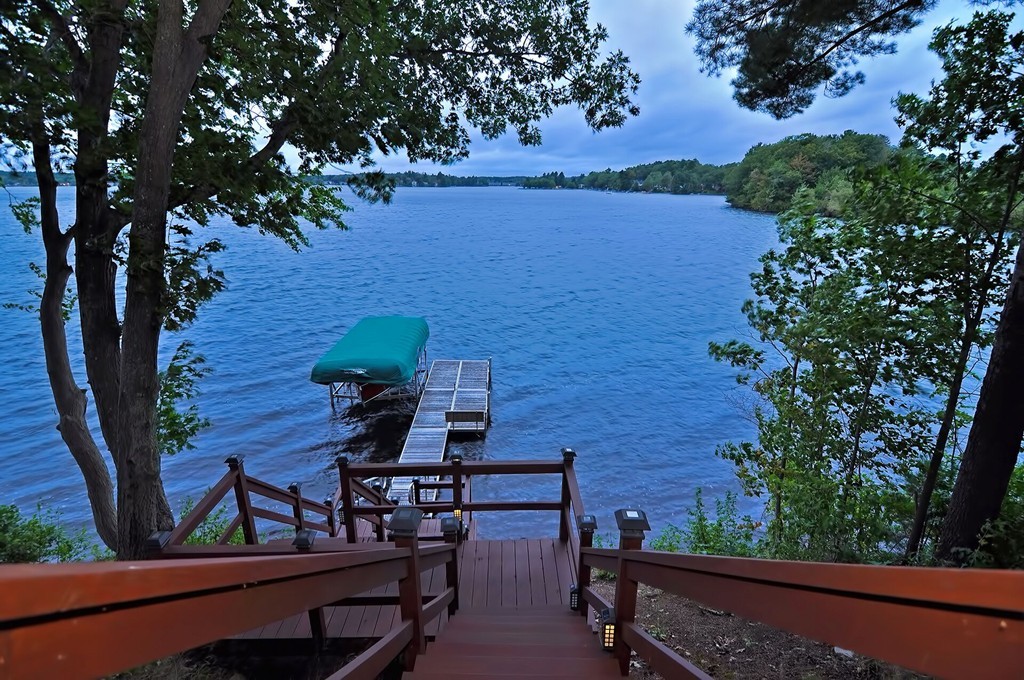 63 Wawela Park Road Webster, MA 01570 - Photo 7 of 30 a view of a backyard with sitting area