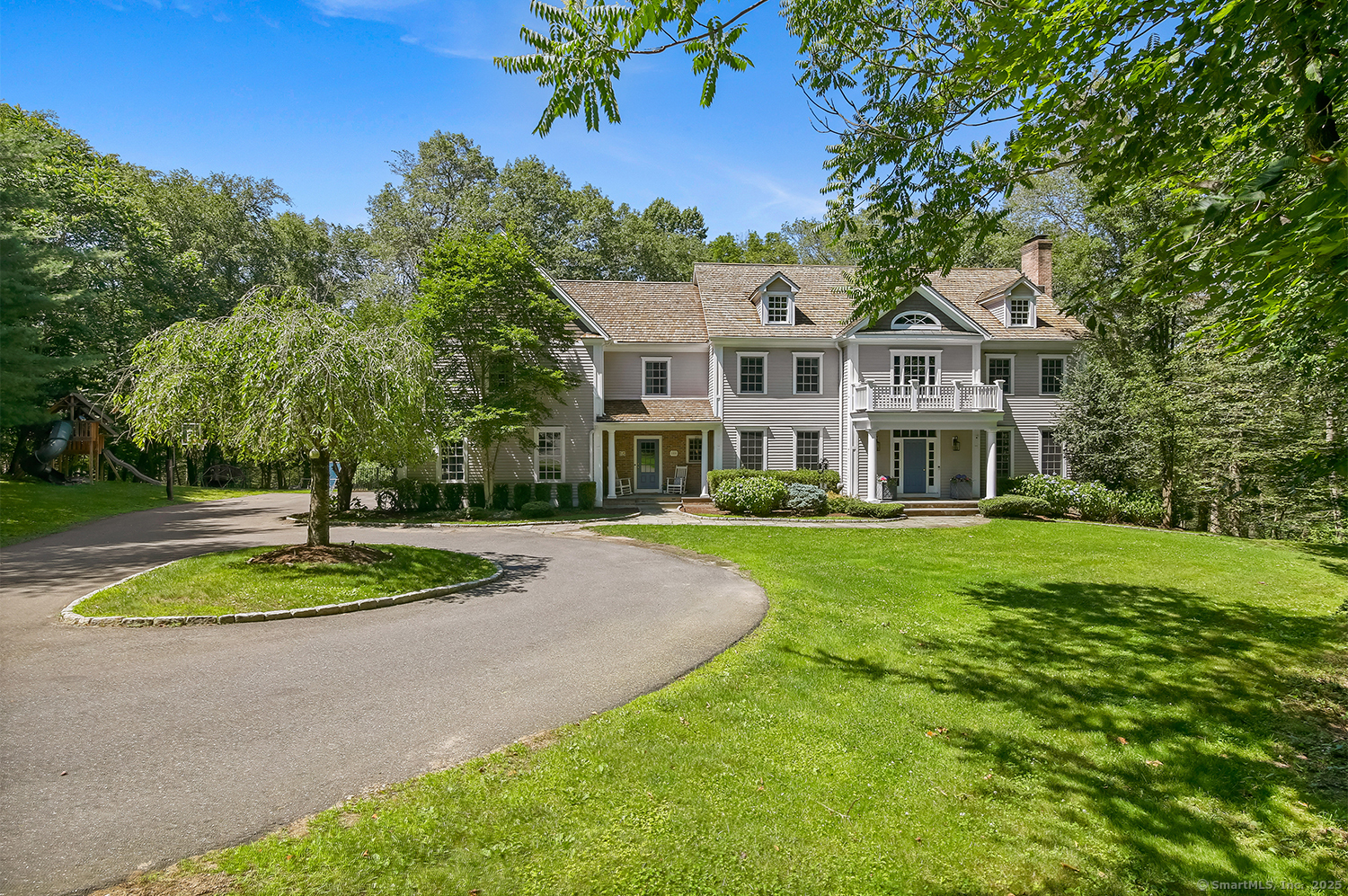 124 Princess Pine Lane Fairfield, CT 06824 - Photo 1 of 1 a front view of a house with a yard
