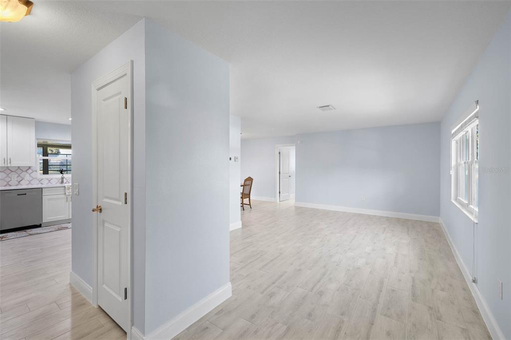 4151 Camelia Drive Hernando Beach, FL 34607 - Photo 8 of 37 a view of empty room with wooden floor