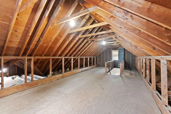 a view of a balcony with chairs