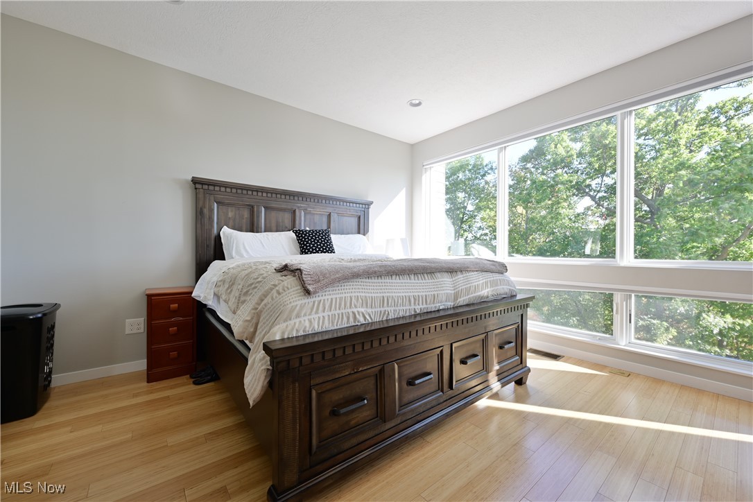 18875 Riversouth Fairview Park, Unit 30 Cleveland, OH 44126 - Photo 17 of 39 Bedroom with light wood-type flooring and recessed lighting