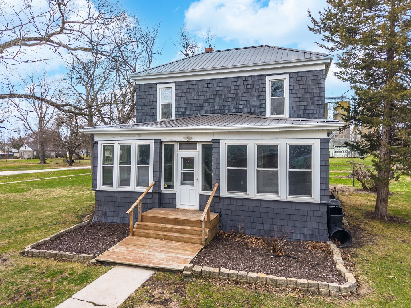 26 Lafayette Street Saunemin, IL 61769 - Photo 1 of 38 a view of a house with a yard