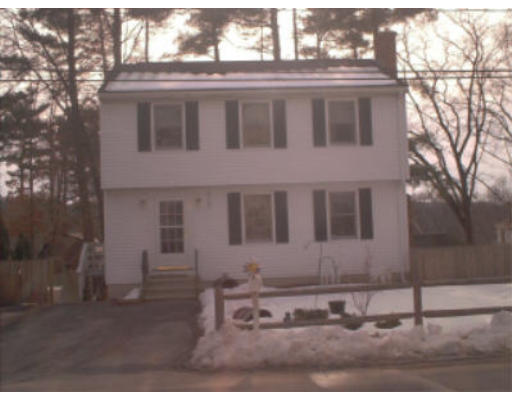20 Valley Road Dracut, MA 01826 - Photo 1 of 1 a front view of a house with a yard