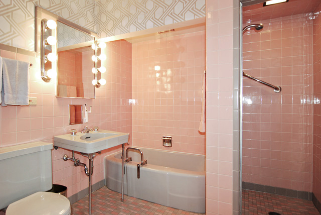 334 Downing Road Riverside, IL 60546 - Photo 11 of 23 a bathroom with a sink toilet tub and shower