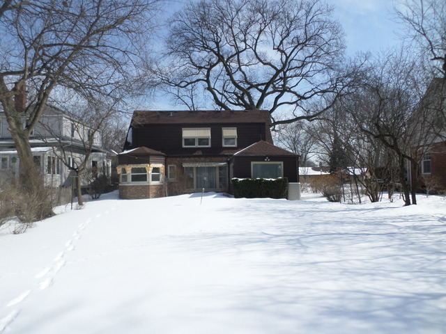 334 Downing Road Riverside, IL 60546 - Photo 13 of 23 a front view of a house with a yard