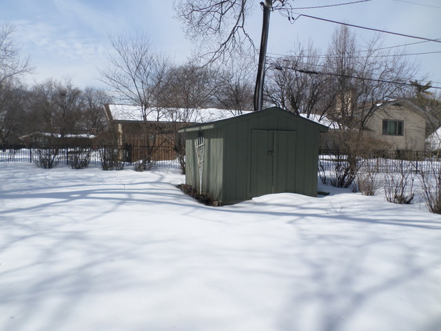 334 Downing Road Riverside, IL 60546 - Photo 16 of 23 a front view of a house with a yard