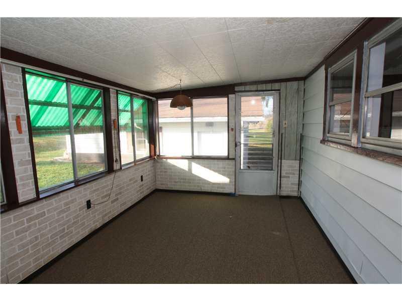 151 Weinman Road Mount Pleasant, PA 15666 - Photo 6 of 13 Sunroom.