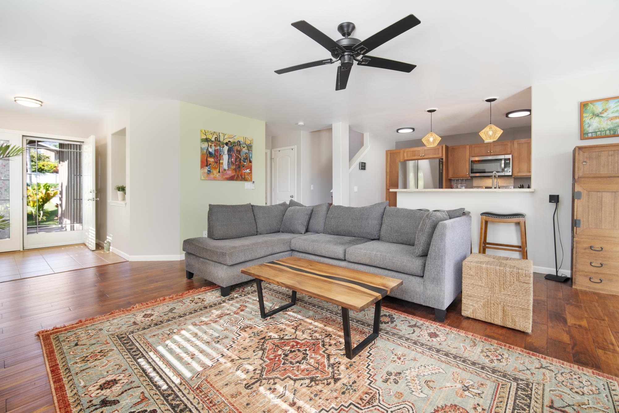 223 Lau Oliwa Loop, Unit 38 Wailuku, HI 96793 - Photo 11 of 50 a living room with furniture and a wooden floor