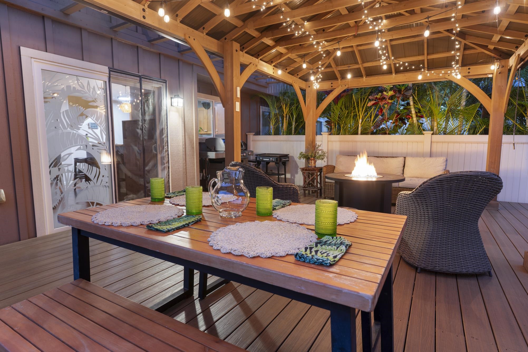 223 Lau Oliwa Loop, Unit 38 Wailuku, HI 96793 - Photo 14 of 50 a outdoor dining space with furniture and wooden floor