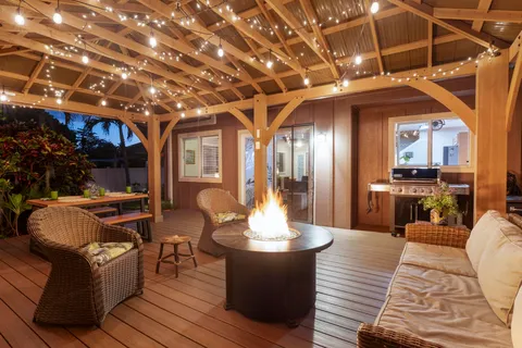 a view of a livingroom with furniture and a fireplace