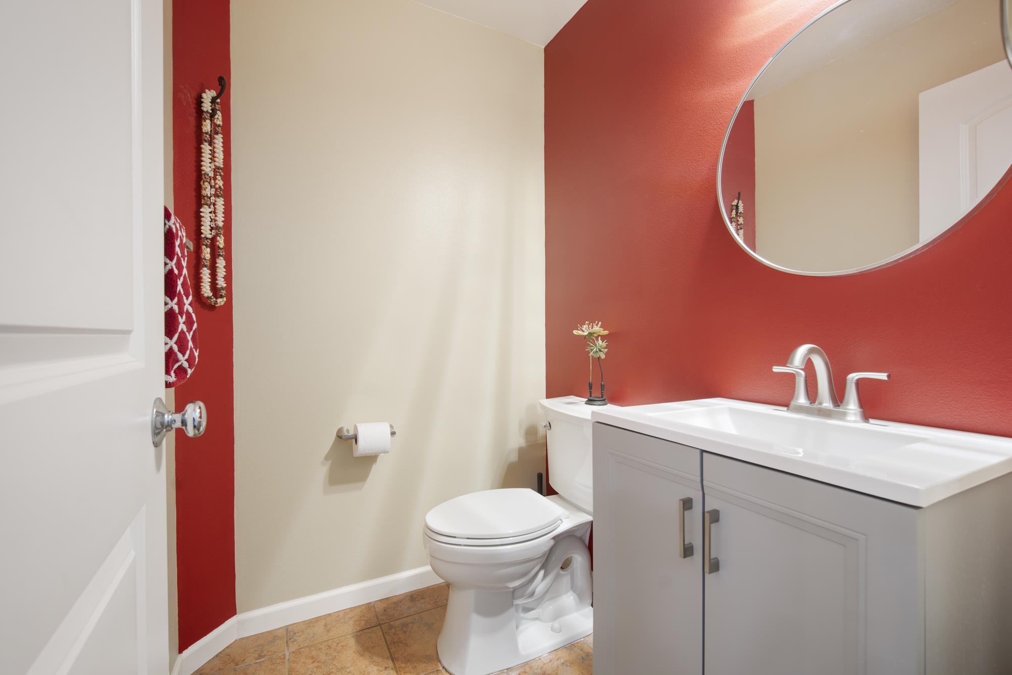 223 Lau Oliwa Loop, Unit 38 Wailuku, HI 96793 - Photo 18 of 50 a bathroom with a sink and a mirror