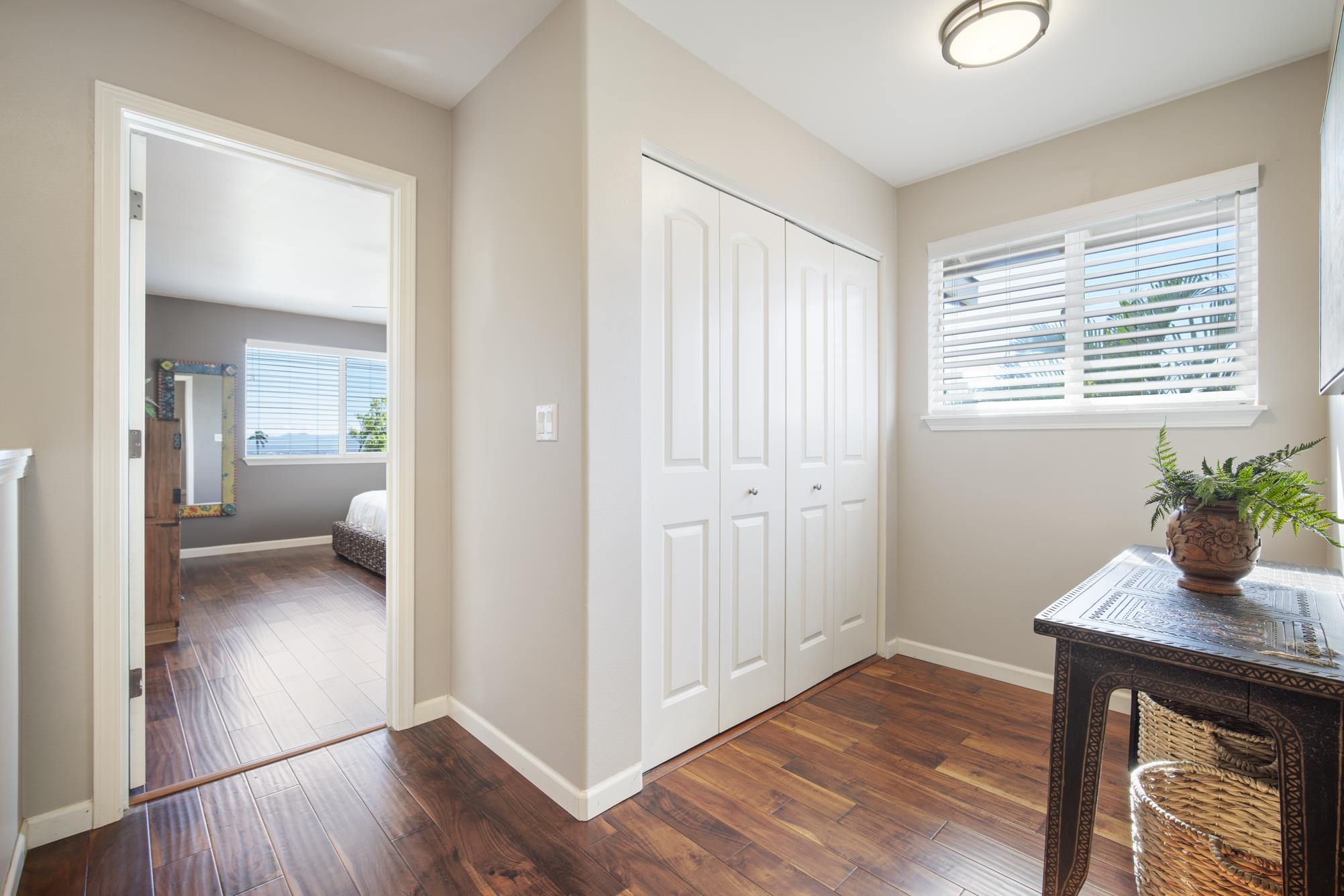 223 Lau Oliwa Loop, Unit 38 Wailuku, HI 96793 - Photo 20 of 50 a view of room with window and wooden floor
