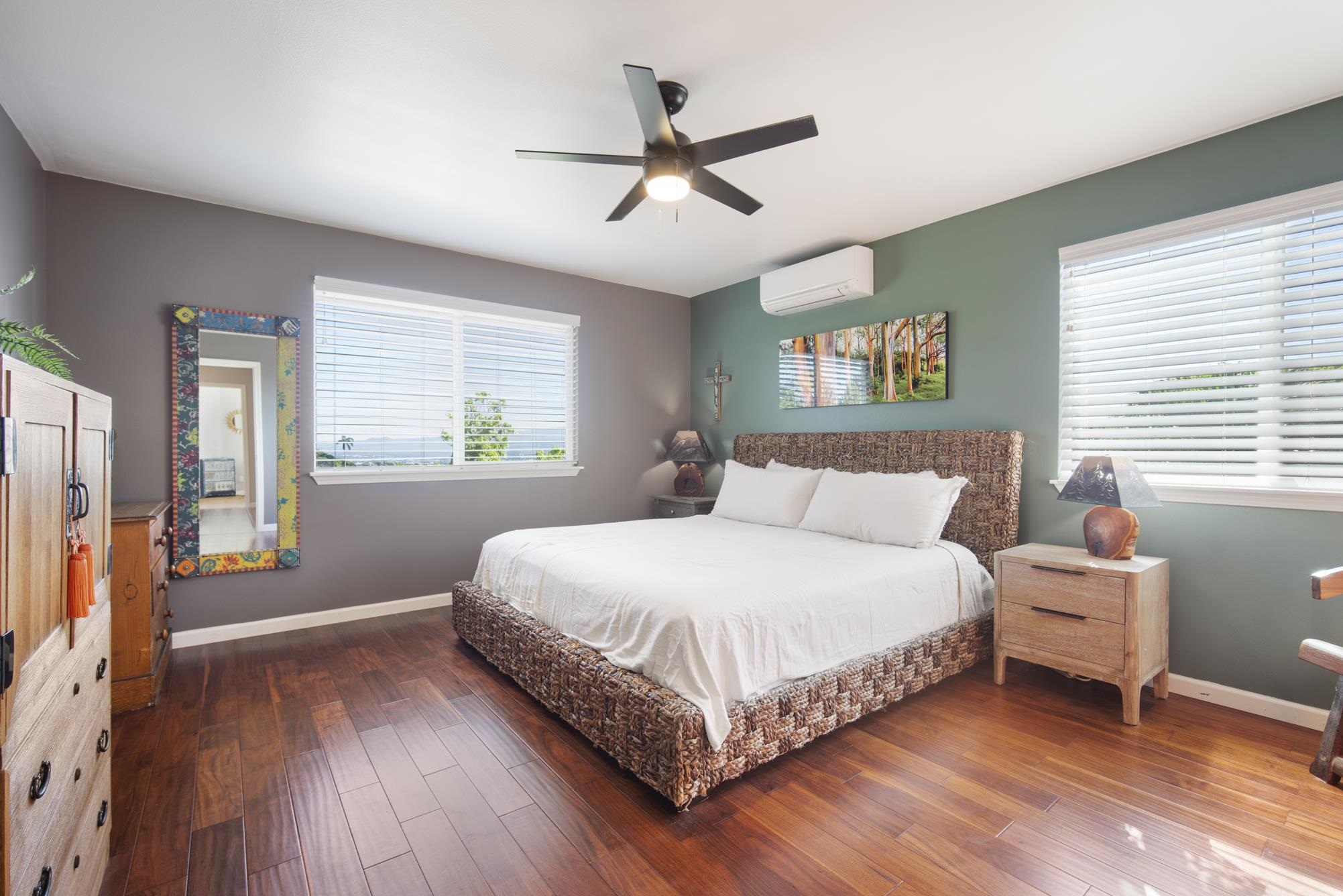 223 Lau Oliwa Loop, Unit 38 Wailuku, HI 96793 - Photo 21 of 50 a bedroom with a bed and a window