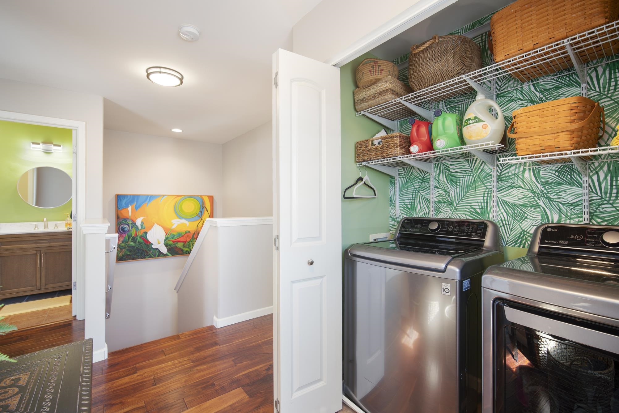 223 Lau Oliwa Loop, Unit 38 Wailuku, HI 96793 - Photo 31 of 50 a view of kitchen with stainless steel appliances granite countertop cabinets and wooden floor