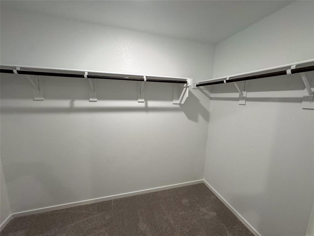 3915 Selawik Street Sherman, TX 75090 - Photo 12 of 19 a view of an empty walk in closet