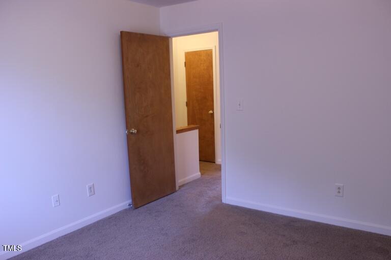 2942 Faversham Place Raleigh, NC 27604 - Photo 7 of 8 a view of an empty room