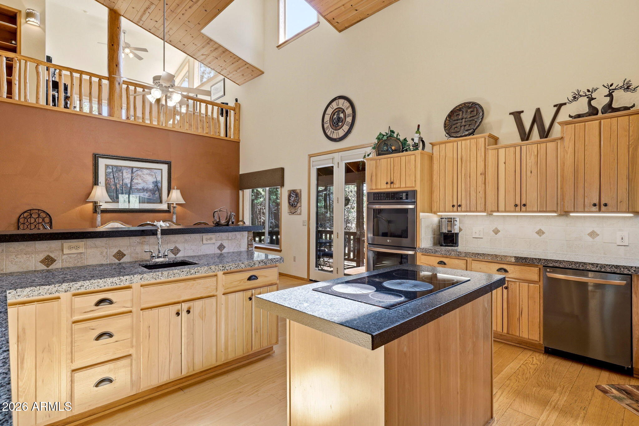 826 Pine Creek Circle Lakeside, AZ 85929 - Photo 8 of 63 a kitchen with stainless steel appliances granite countertop a sink and cabinets