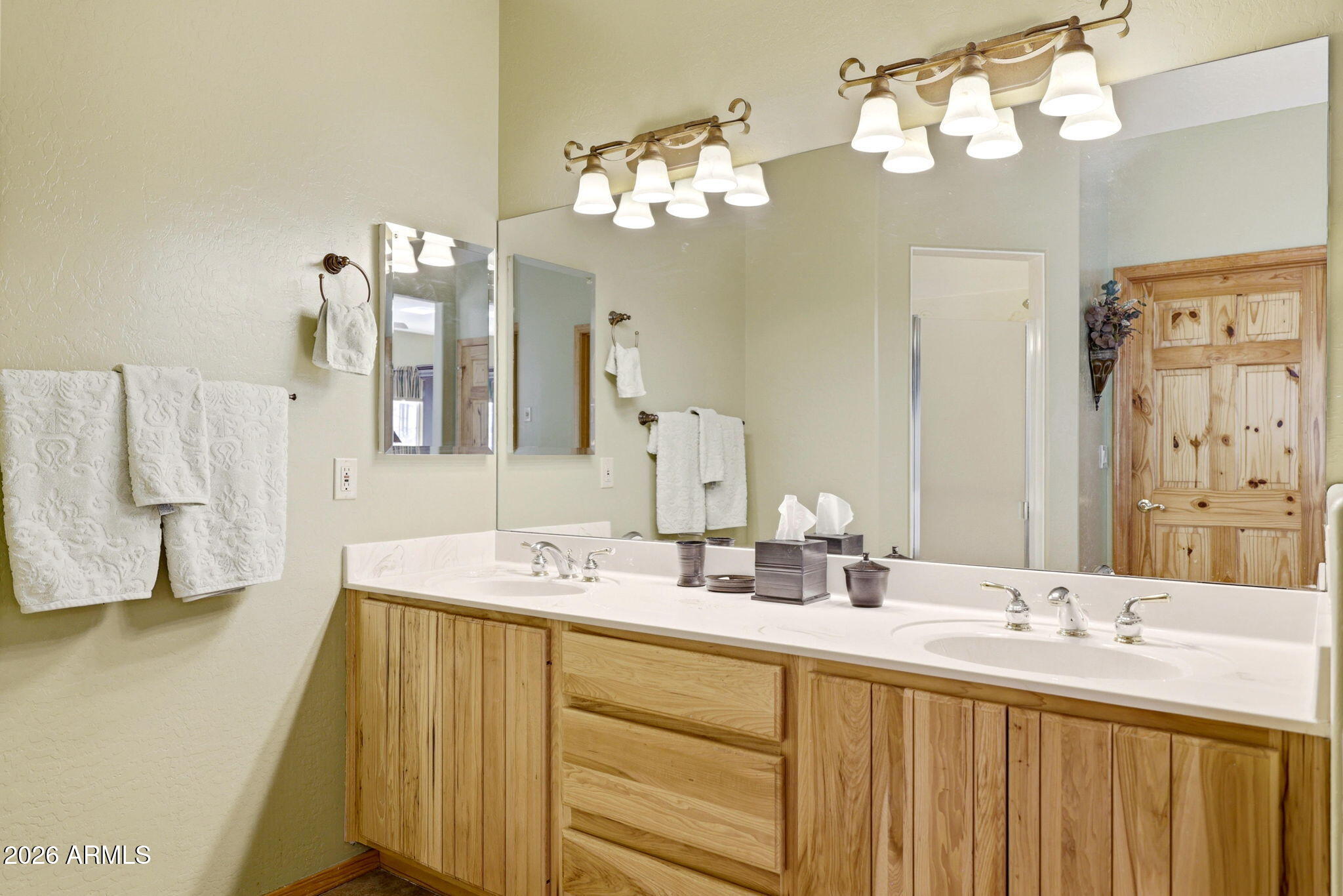 826 Pine Creek Circle Lakeside, AZ 85929 - Photo 15 of 63 a bathroom with a double vanity sink and a mirror