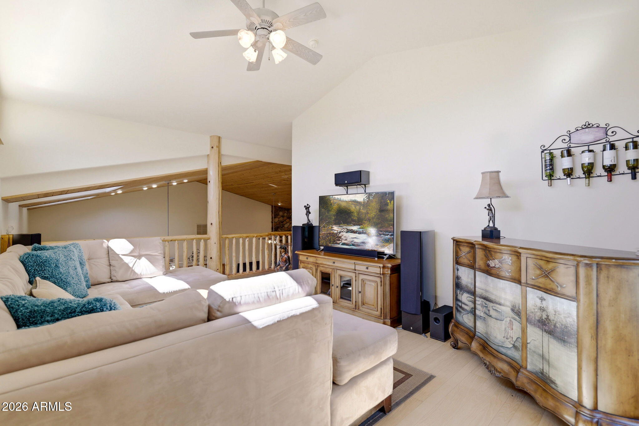 826 Pine Creek Circle Lakeside, AZ 85929 - Photo 20 of 63 a living room with furniture and a flat screen tv