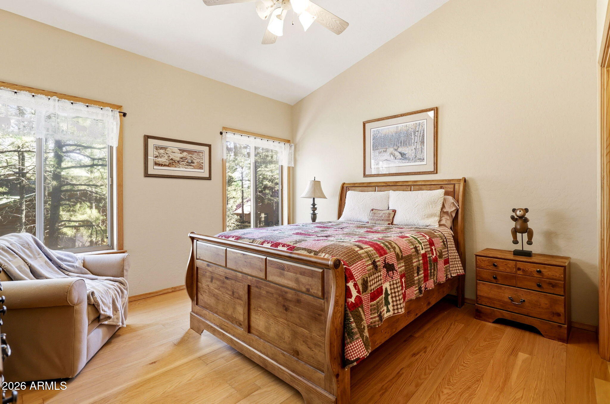 826 Pine Creek Circle Lakeside, AZ 85929 - Photo 30 of 63 a bedroom with a bed and a couch