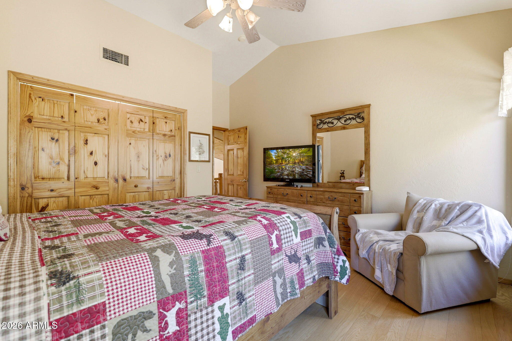 826 Pine Creek Circle Lakeside, AZ 85929 - Photo 31 of 63 a bedroom with a bed and a couch