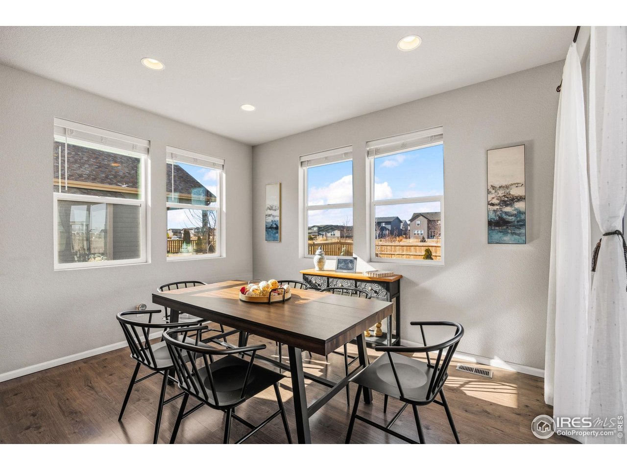 5247 Alberta Falls Street Timnath, CO 80547 - Photo 16 of 43 Dining space with views