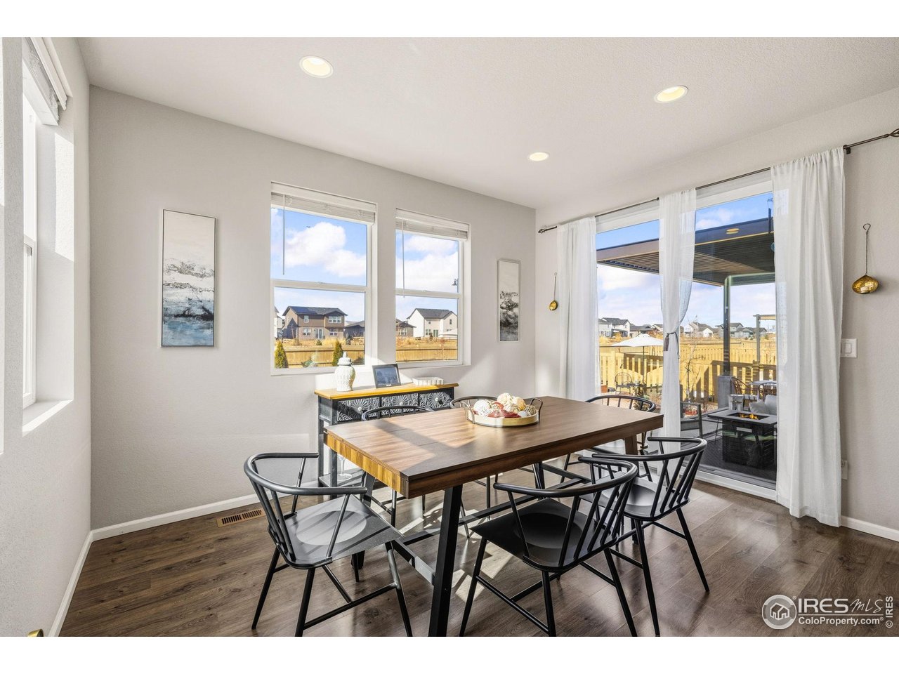 5247 Alberta Falls Street Timnath, CO 80547 - Photo 17 of 43 Dining space with views of the backyard