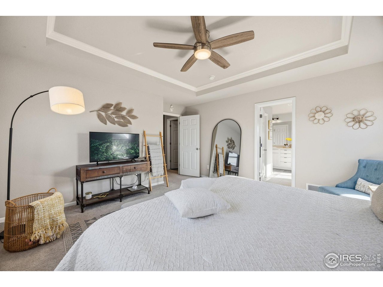 5247 Alberta Falls Street Timnath, CO 80547 - Photo 19 of 43 Generous primary bedroom