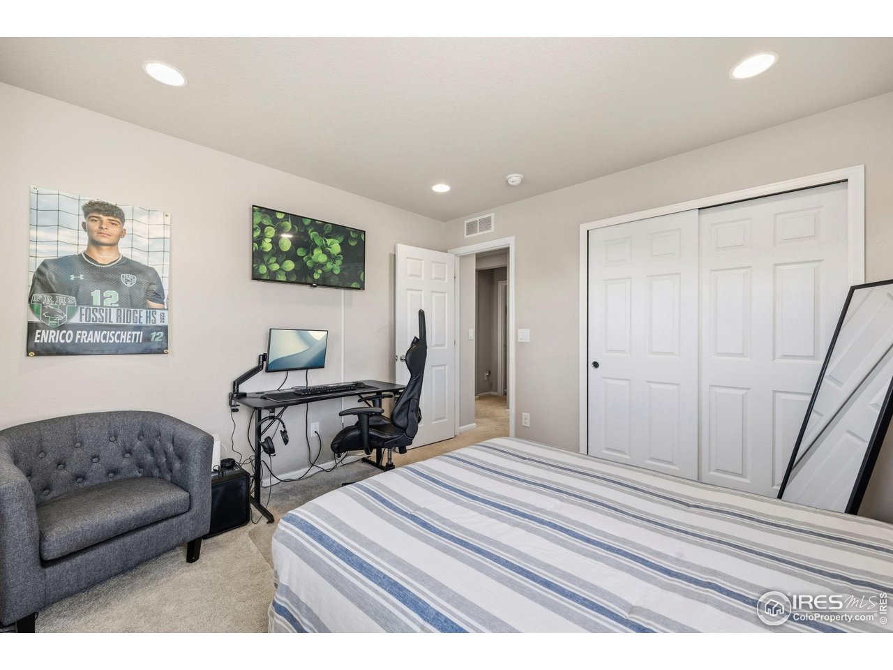 5247 Alberta Falls Street Timnath, CO 80547 - Photo 27 of 43 Bright third bedroom with recessed lighting and space for a desk and a sitting area