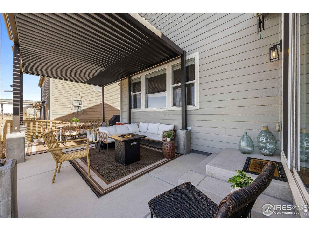 5247 Alberta Falls Street Timnath, CO 80547 - Photo 31 of 43 Covered patio