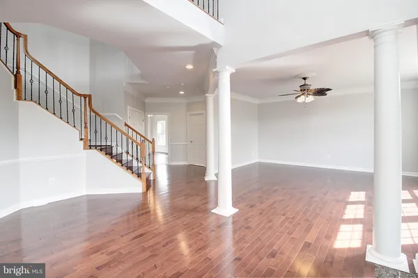a view of entryway with wooden floor