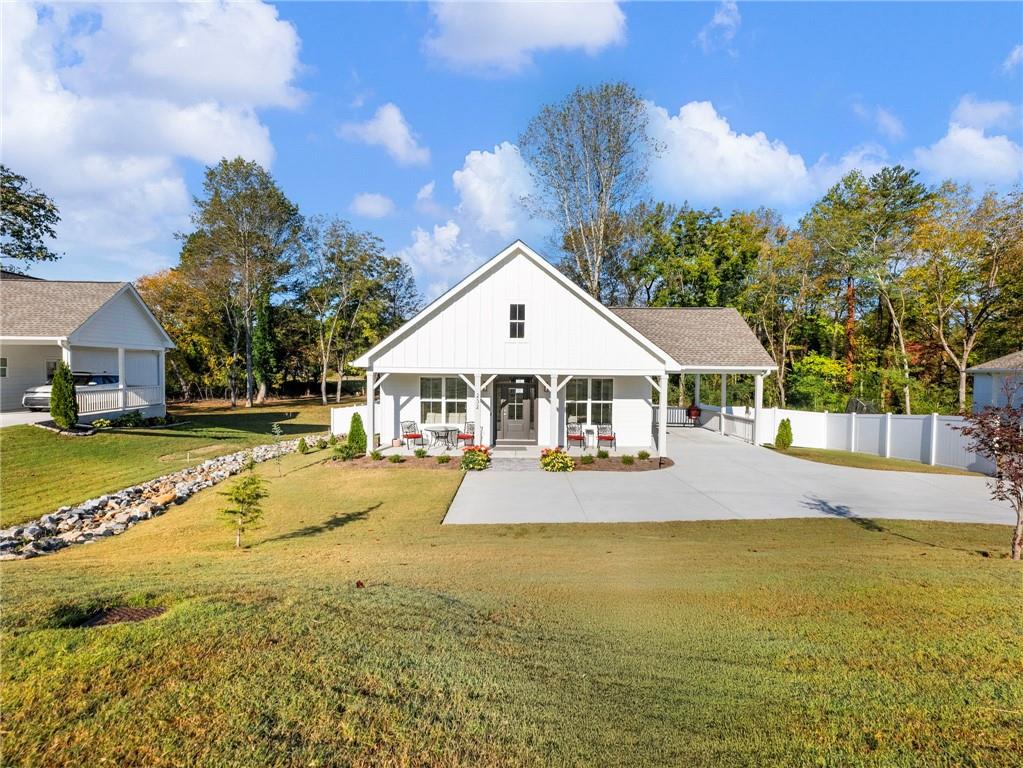 232 Campbell Street Cleveland, GA 30528 - Photo 1 of 37 a front view of a house with swimming pool