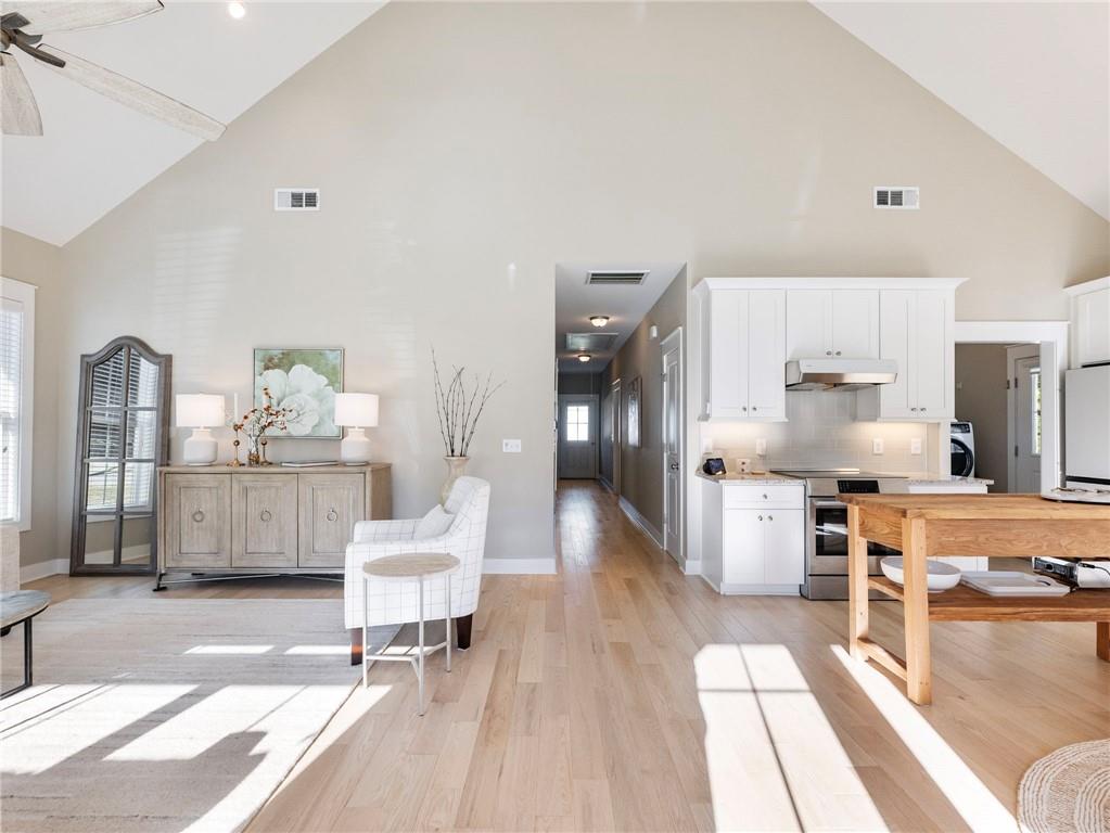 232 Campbell Street Cleveland, GA 30528 - Photo 2 of 37 a living room with furniture and wooden floor