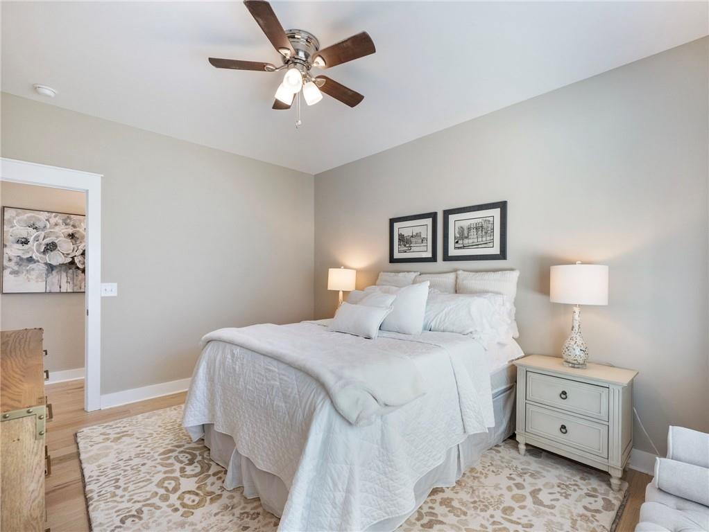 232 Campbell Street Cleveland, GA 30528 - Photo 23 of 37 a bedroom with a bed and a painting on the wall