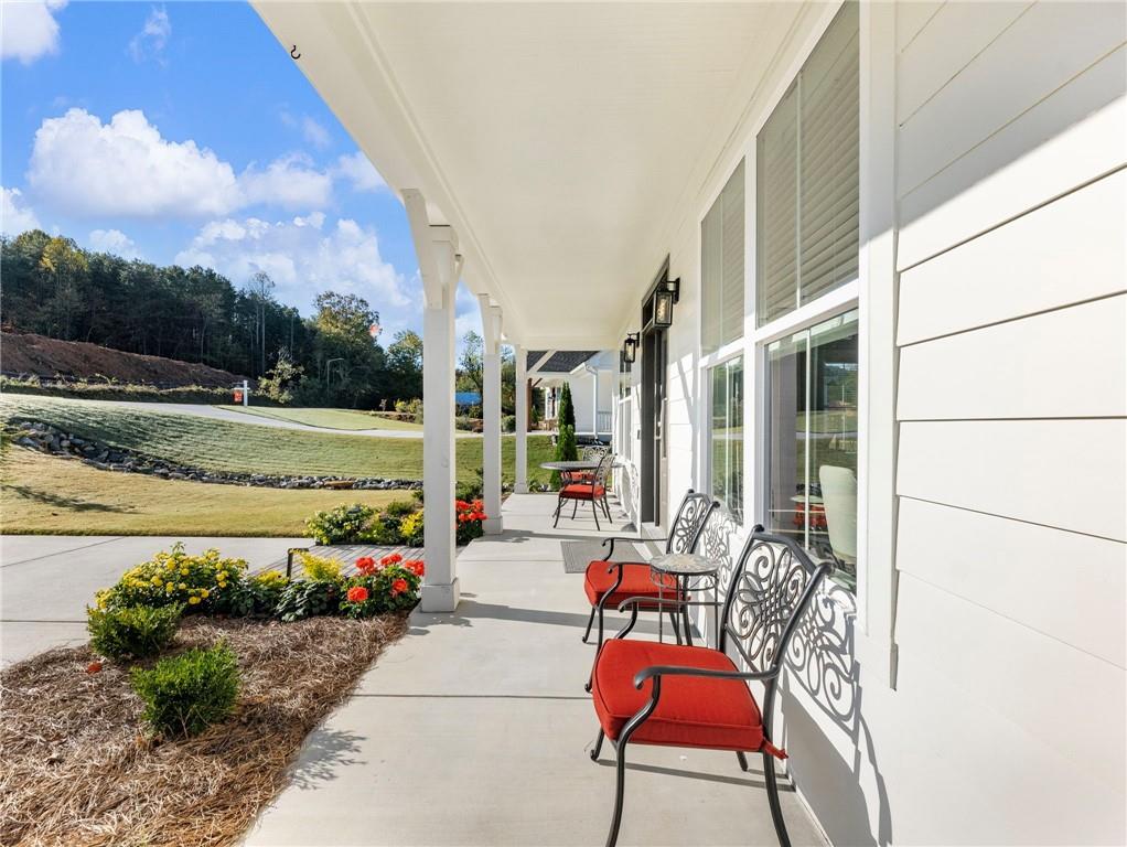 232 Campbell Street Cleveland, GA 30528 - Photo 25 of 37 a view of chairs and tables in the patio