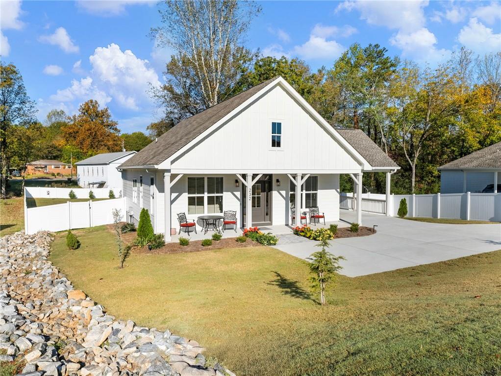 232 Campbell Street Cleveland, GA 30528 - Photo 28 of 37 a view of a house with backyard porch and sitting area