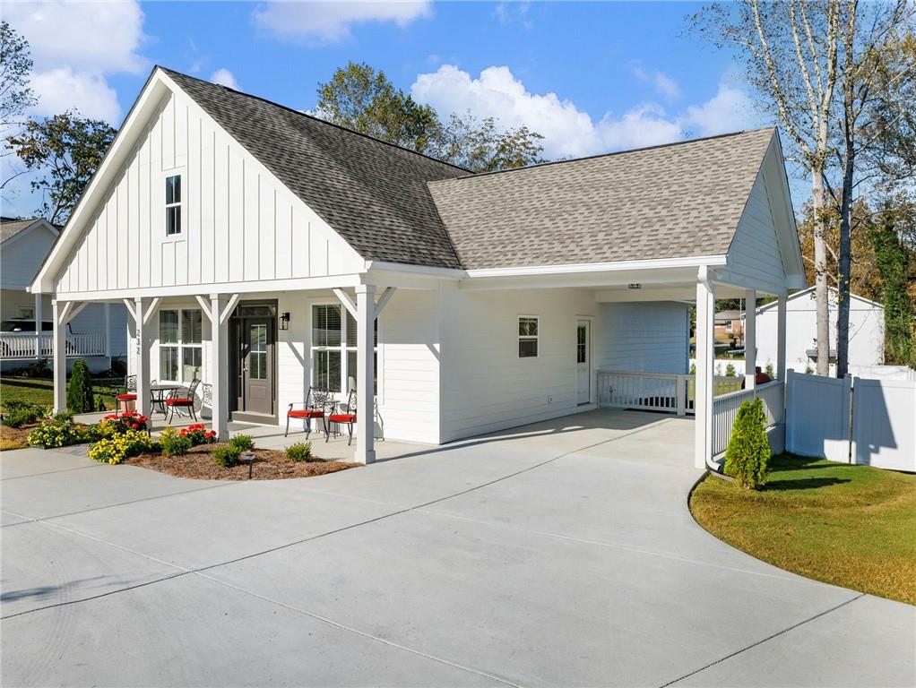 232 Campbell Street Cleveland, GA 30528 - Photo 29 of 37 a view of a house with outdoor seating area