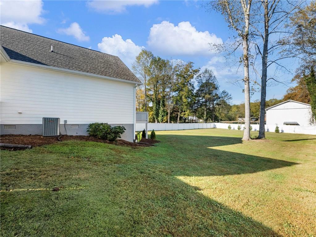 232 Campbell Street Cleveland, GA 30528 - Photo 31 of 37 a view of a garden with a house