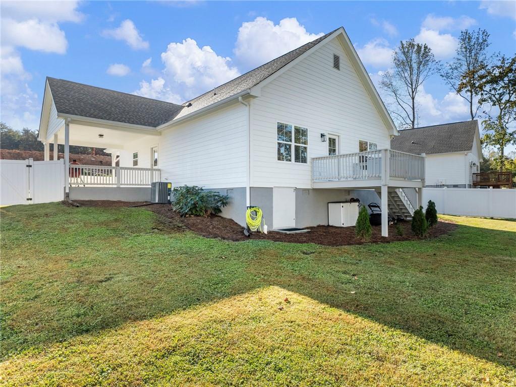 232 Campbell Street Cleveland, GA 30528 - Photo 36 of 37 a view of a house with a backyard