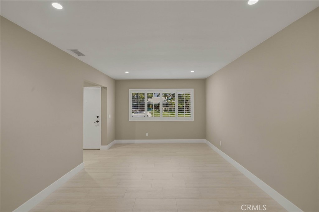 5874 Olive Avenue Rialto, CA 92377 - Photo 24 of 50 a view of an empty room with a window