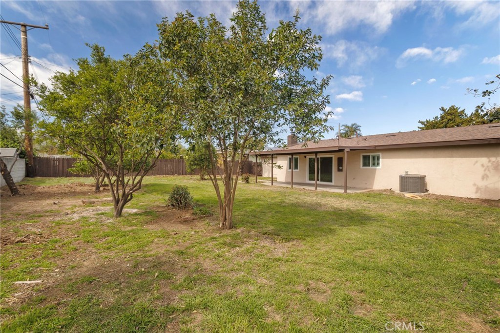 5874 Olive Avenue Rialto, CA 92377 - Photo 38 of 50 a view of a house with a backyard