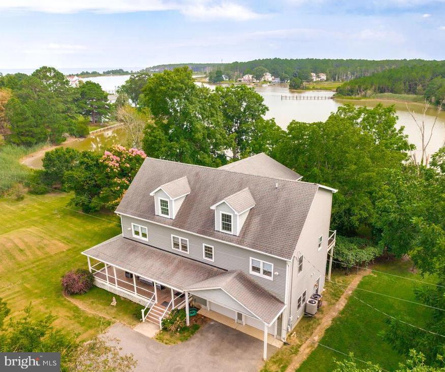 50333 Scotland Beach Road Scotland, MD 20687 - Photo 7 of 95 an aerial view of a house with a garden and lake view