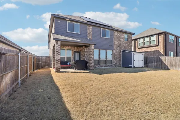 a house view with a outdoor space