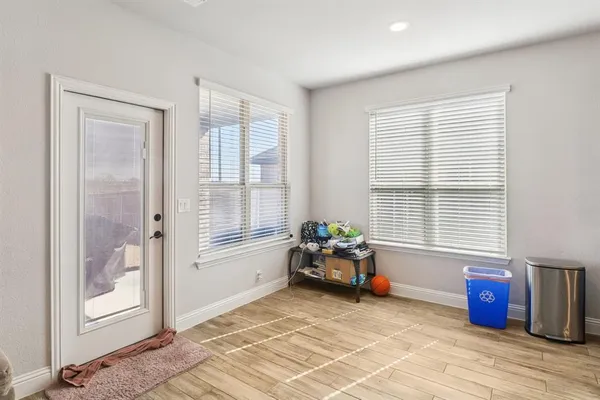 a livingroom with workspace and a window
