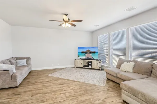 a living room with furniture and a couch