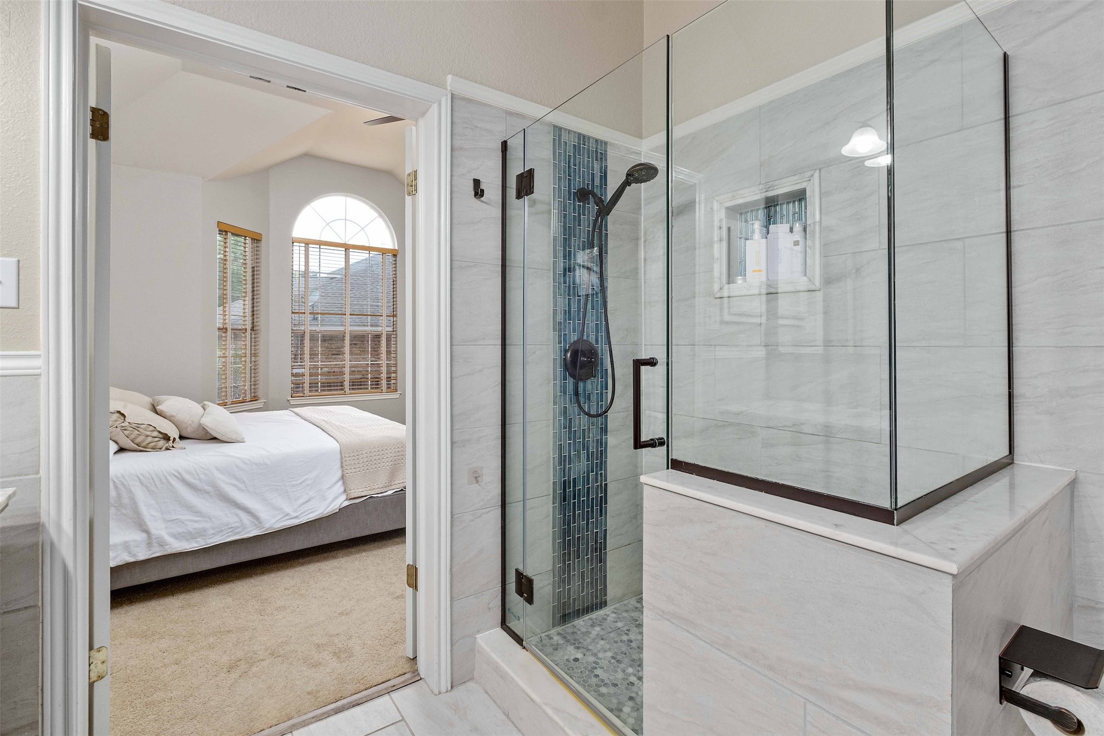3704 Runnels Court Austin, TX 78732 - Photo 17 of 30 Ensuite bathroom with ensuite bath and a shower