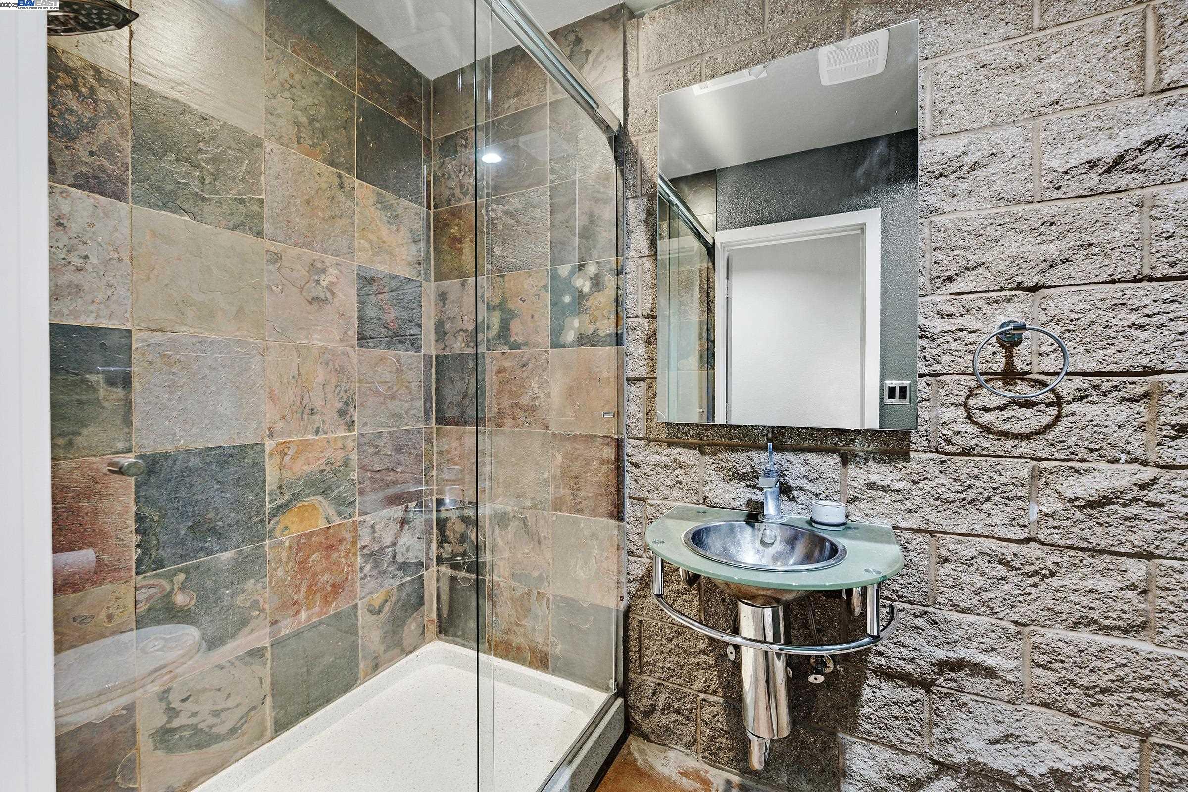 17011 North Midway Road Tracy, CA 95377 - Photo 25 of 52 a bathroom with a sink and a mirror