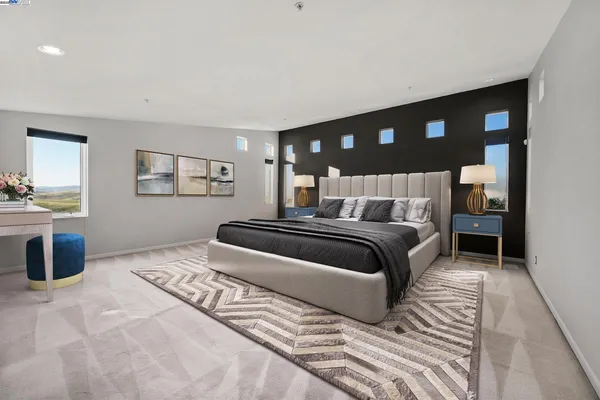 a large kitchen with stainless steel appliances kitchen island a large counter top