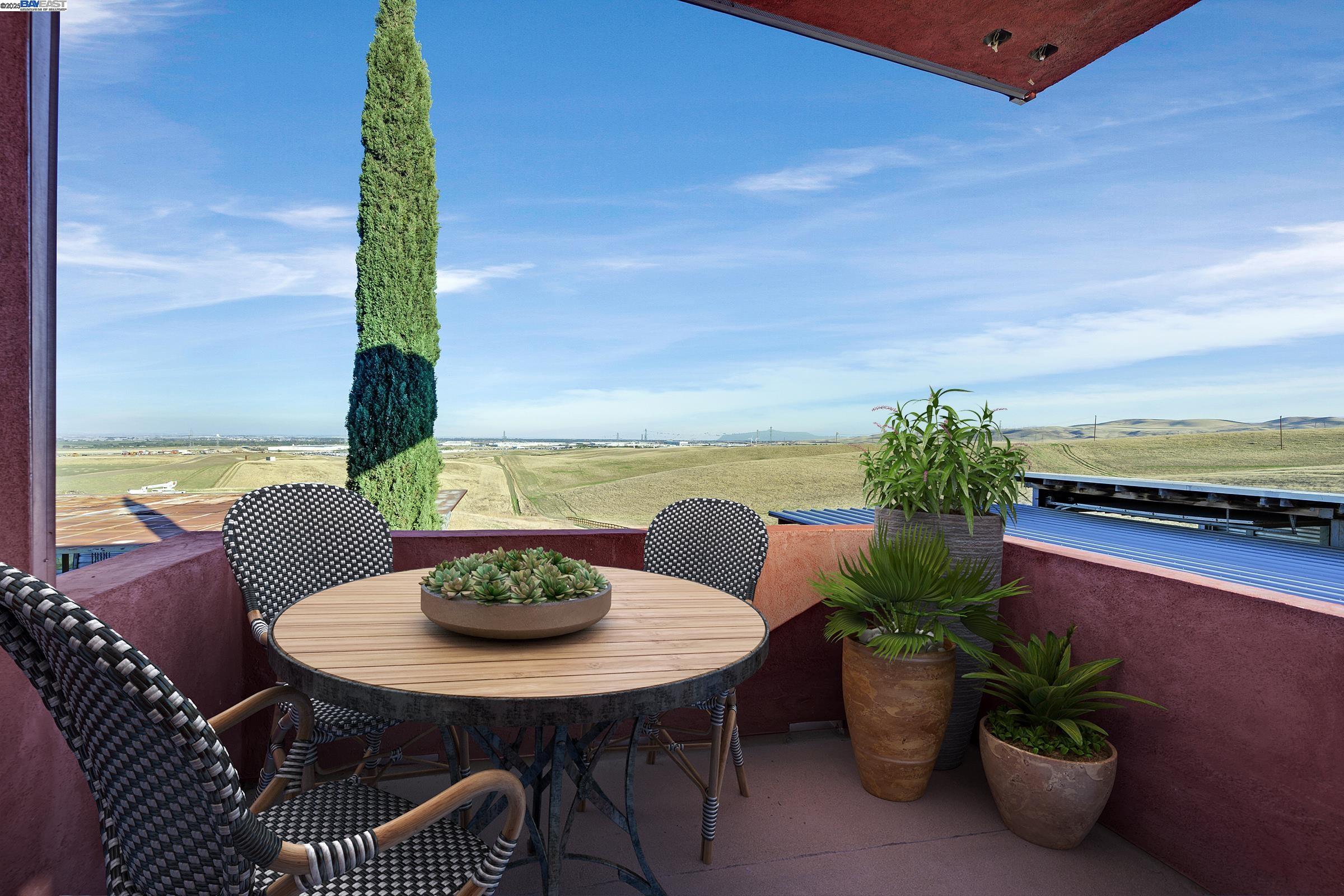 17011 North Midway Road Tracy, CA 95377 - Photo 41 of 52 a view of a chairs and table on the terrace