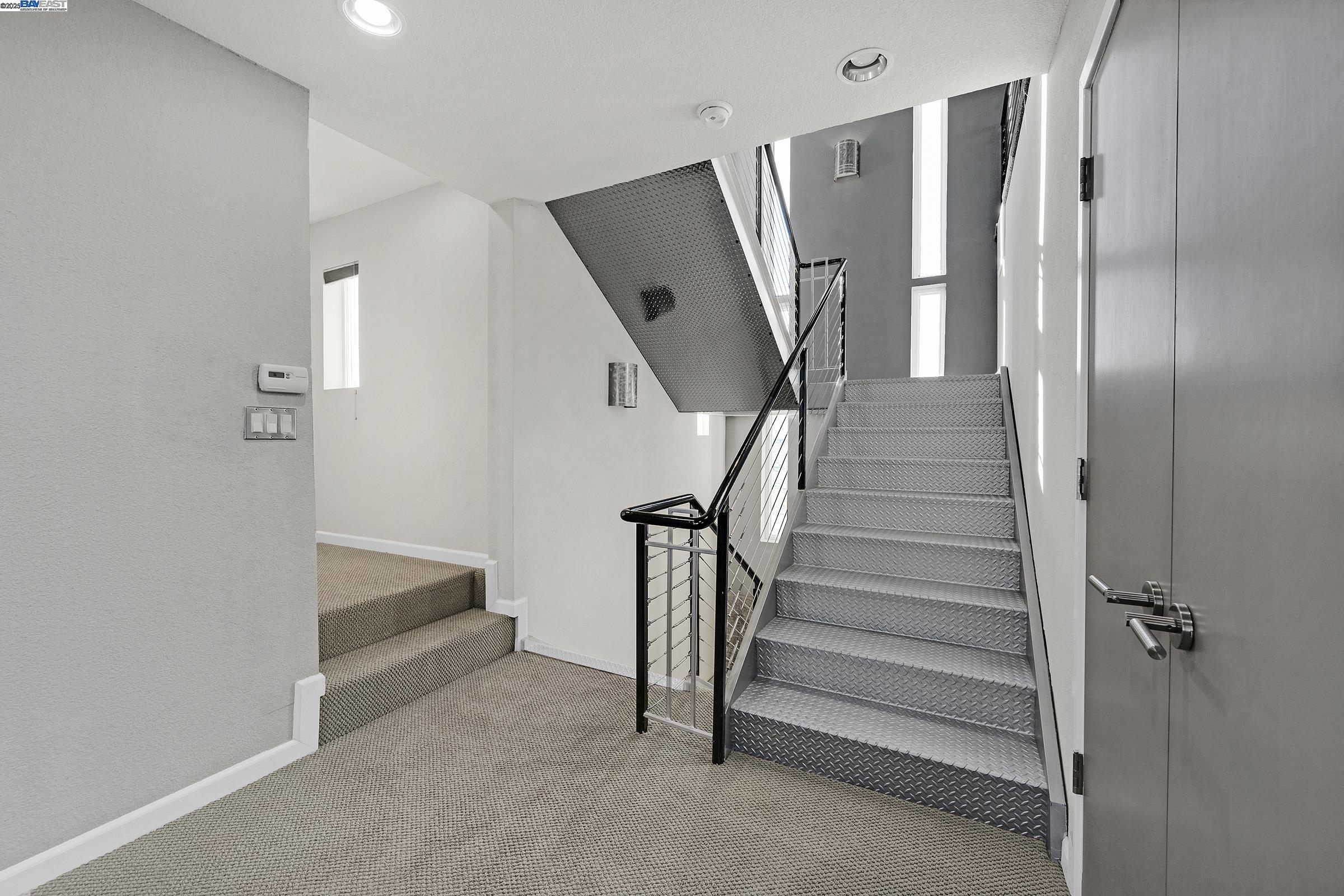 17011 North Midway Road Tracy, CA 95377 - Photo 42 of 52 a view of staircase with white walls and window